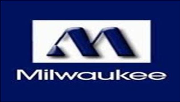 A navy blue background with a white rectangle near the center featuring a stylized, three-dimensional dark blue letter "M." Below the rectangle, the word "Milwaukee" is written in white.