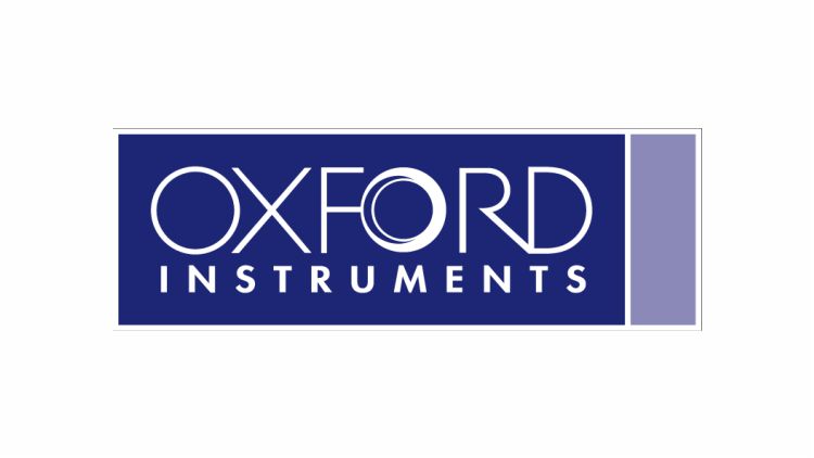 The Oxford Instruments logo features the company name in white, bold, capital letters on a blue background. The letter "O" is stylized with a circular, target-like design. A vertical light purple bar is on the right side of the logo.