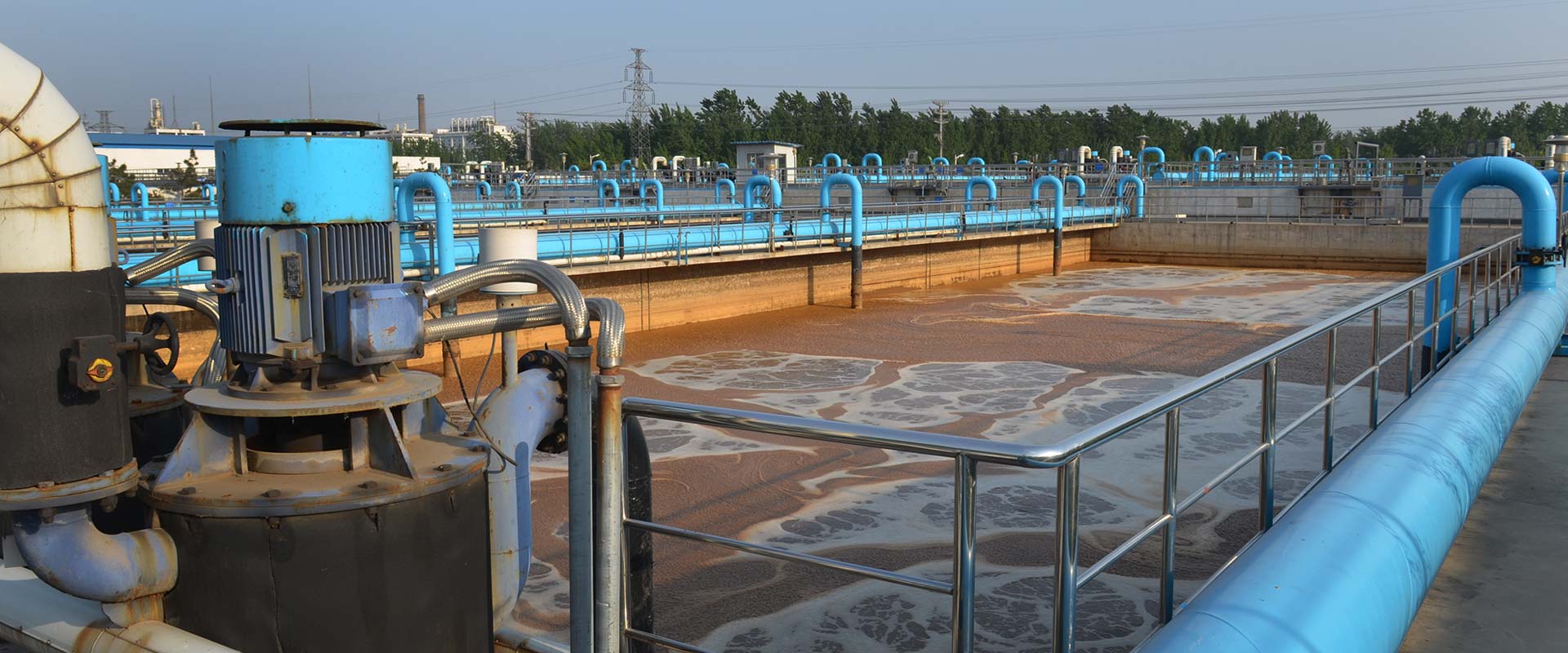 Water treatment process and equipment banner showcasing modern water purification.